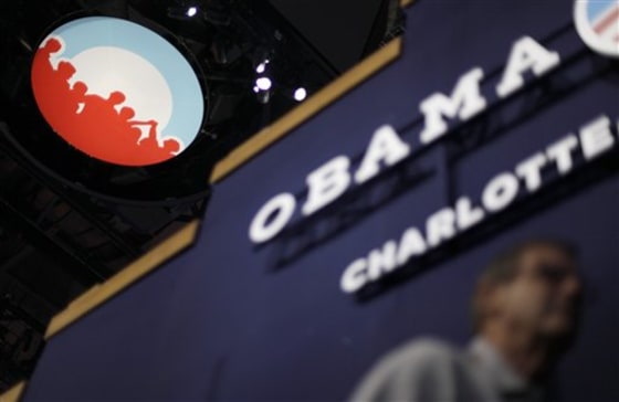 Obama campaign logo is seen under the scoreboard hanging from the ceiling inside of Time Warner Cable Arena at the Democratic National Convention in Charlotte, N.C., on Monday, Sept. 3, 2012.